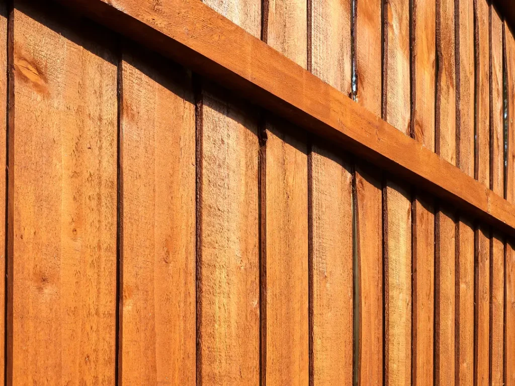 a close up of a wood fence