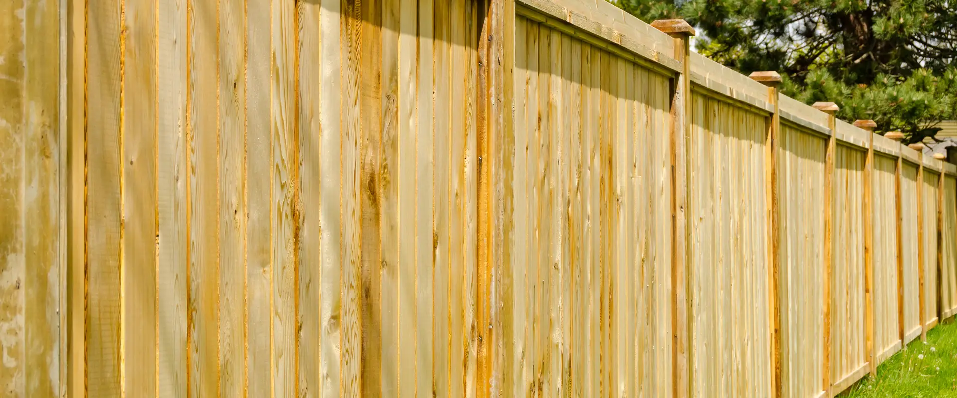a wooden fence with a wooden gate
